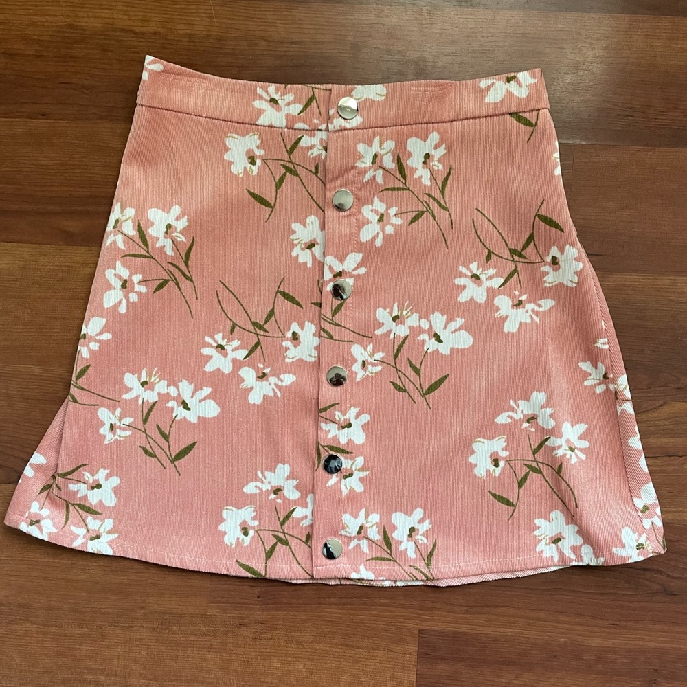 Pink skirt with white flowers, like new, never worn